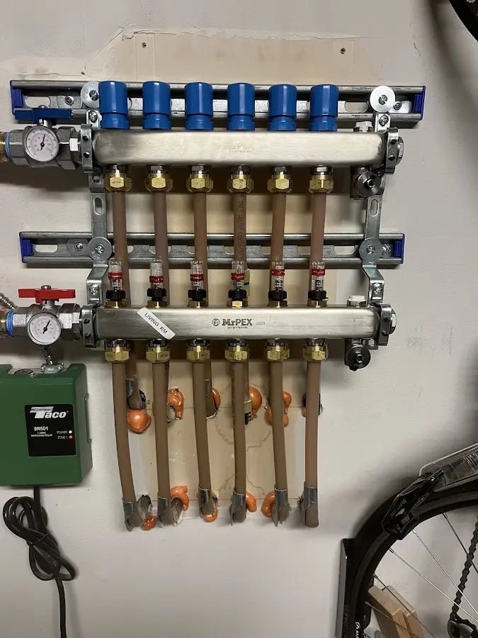 Plumber performing Leak Detection at a residential property in Kirkland